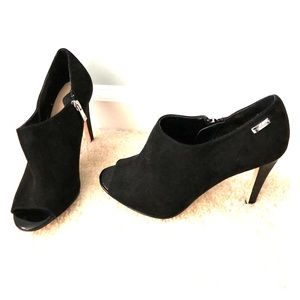 Calvin Klein black suede peep toe pumps